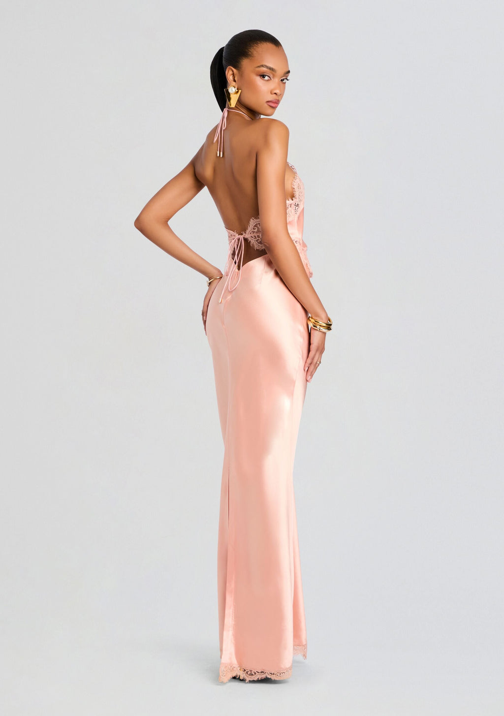 Everly Dress back view in blush pink satin with lace halter top and open back