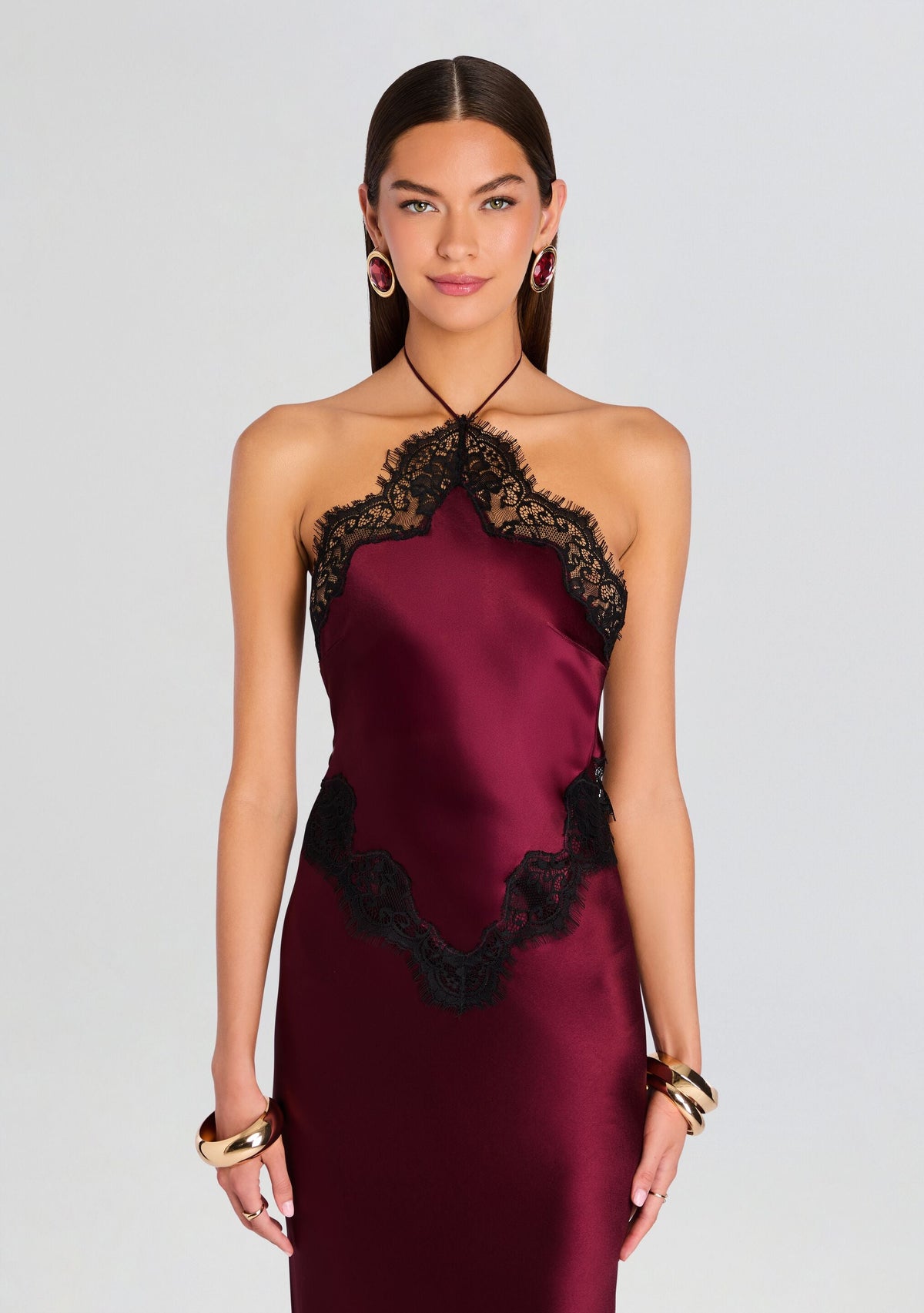Front view of burgundy satin Everly Dress with black lace halter neckline